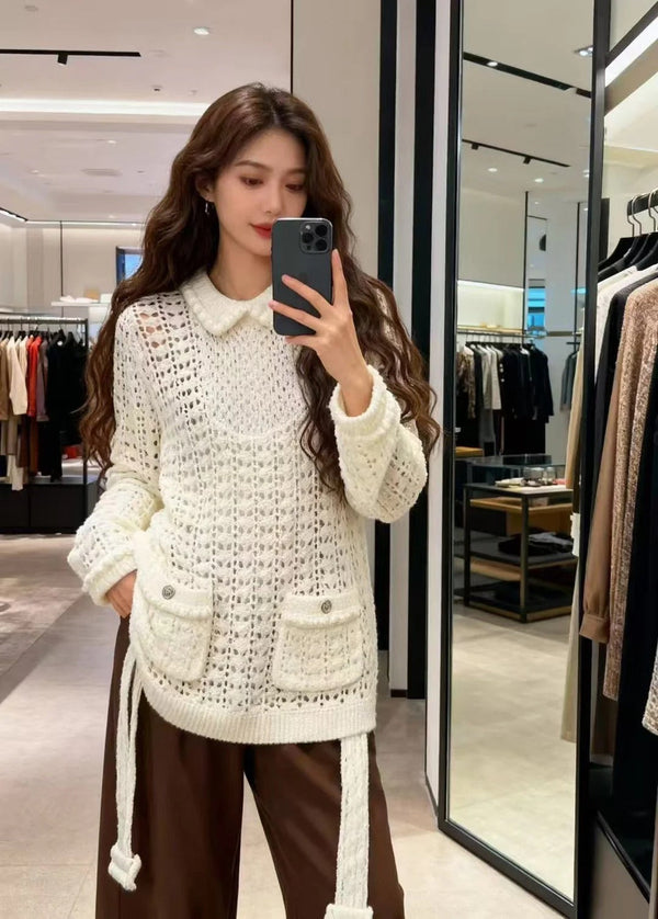 PULL AJOURÉ À NŒUD À LA TAILLE CHANEL 25S 528