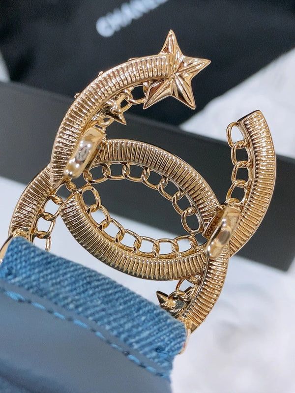 CINTURA ELASTICA DOPPIA C 30 MM IN DENIM BLU FIBBIA DECORATA CON STELLA DI CRISTALLI ORO