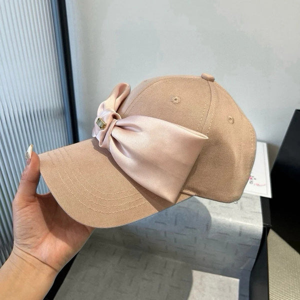 MM BASEBALL CAP IN BEIGE FABRIC WITH LARGE PINK BOW