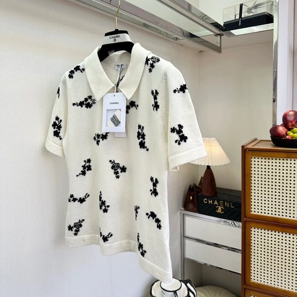 Polo Chanel 2026 en coton noir et blanc à imprimé floral
