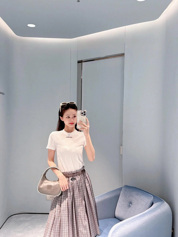 JUPE PLISSÉE À CARREAUX MIUMIU STYLE 718