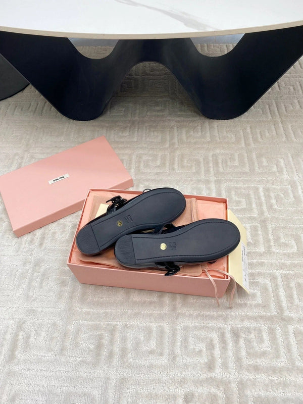 BOW MARY JANE FLAT IN BLACK NAPLAK LAMBSKIN