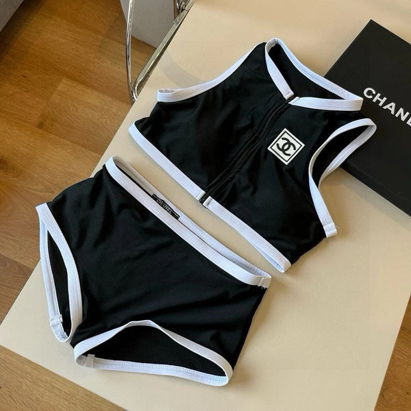 Completo costume da bagno bikini CC con finiture nere e bianche 596500