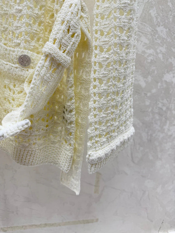 PULL AJOURÉ À NŒUD À LA TAILLE CHANEL 25S 528