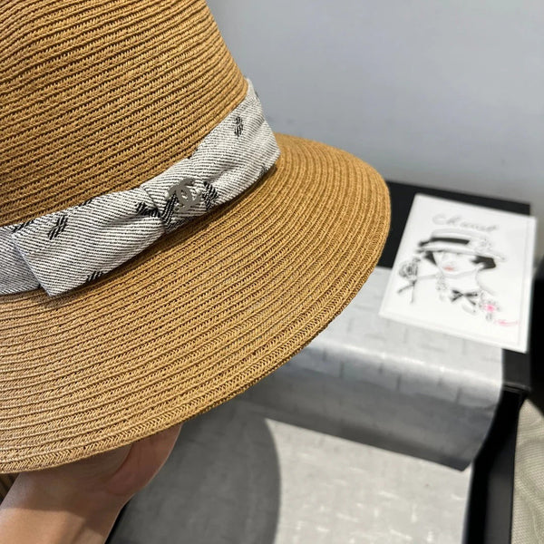 STRAW BUCKET HAT IN BROWN WITH RIBBON BOW 673978