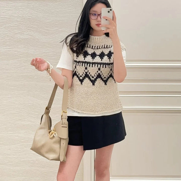 DIOR PULL SANS MANCHES 25S 495