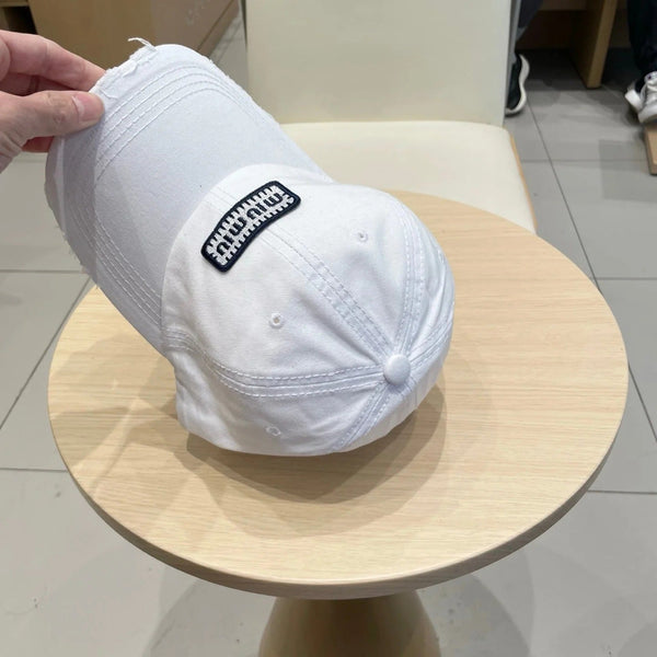 MM DISTRESSED FABRIC BASEBALL CAP IN WHITE WITH EMBROIDERED LOGO