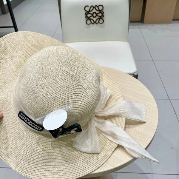 MM WIDE-BRIM BEACH HAT IN LIGHT BEIGE WITH FABRIC BOW
