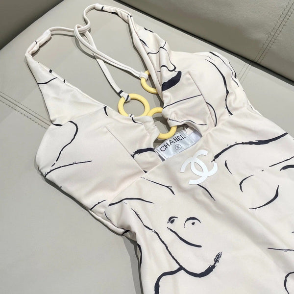 CC BIKINI SWIMSUIT SET IN CREAMY WHITE MIXED WITH CURVED BLACK DETAIL 608919