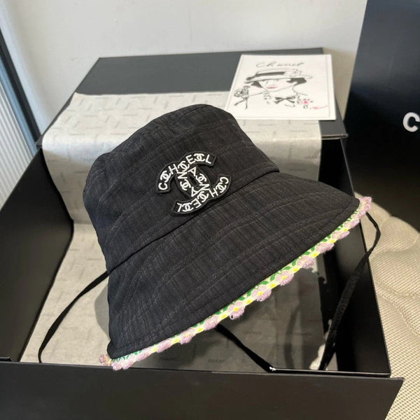 CAPPELLO ALLA PESCATORE NERO CON BORDO FLOREALE 673996