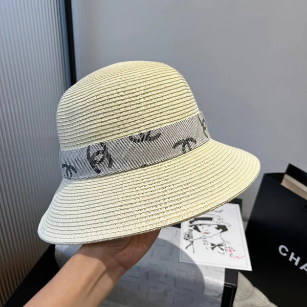 STRAW BUCKET HAT IN IVORY WITH RIBBON BOW 673977