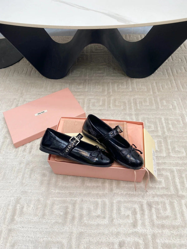 BOW MARY JANE FLAT IN BLACK NAPLAK LAMBSKIN