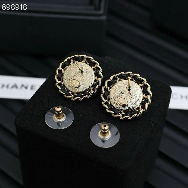 CC 25P STUD EARRINGS IN BLUE DENIM BLACK CALFSKIN-THREADED BUTTON