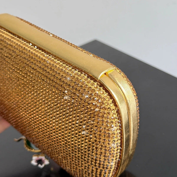 Bottega Veneta Pochette ornée de nœuds 2026 19 cm, en cuir et cristaux dorés, Minaudière