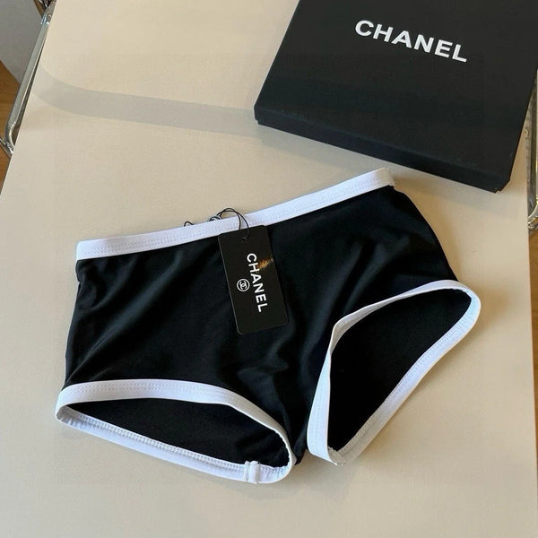 Completo costume da bagno bikini CC con finiture nere e bianche 596500