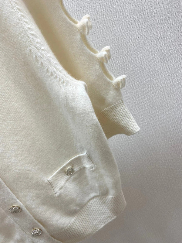 CHANEL CARDIGAN EN TRICOT RAS-DE-COU MANCHES COURTES 25S 317