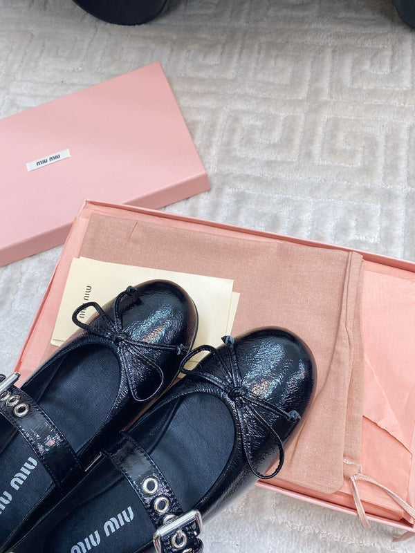 BOW MARY JANE FLAT IN BLACK NAPLAK LAMBSKIN