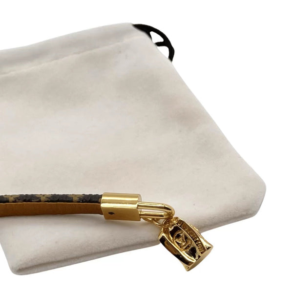 ZAINO LV CON CINTURINO IN PELLE E BRACCIALE IN ORO