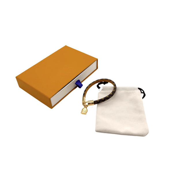 ZAINO LV CON CINTURINO IN PELLE E BRACCIALE IN ORO