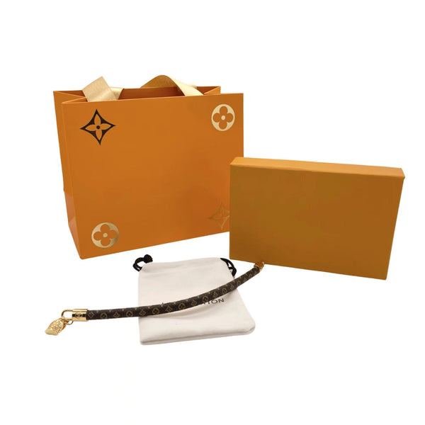 ZAINO LV CON CINTURINO IN PELLE E BRACCIALE IN ORO