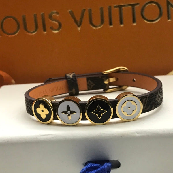 BRACCIALE IN ORO CON 4 MOTIVI IN CORDA DI PELLE LV