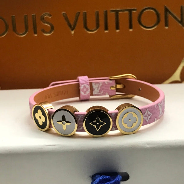BRACCIALE IN ORO CON 4 MOTIVI IN CORDA DI PELLE LV