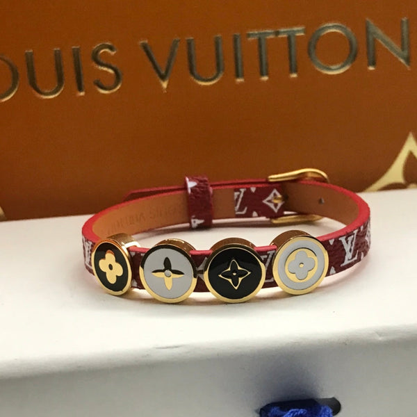BRACCIALE IN ORO CON 4 MOTIVI IN CORDA DI PELLE LV