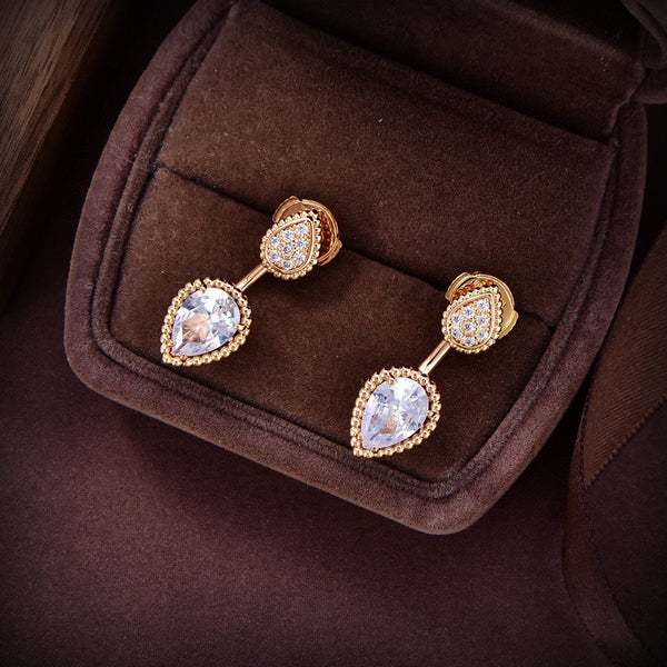 ORECCHINI A FORMA DI C CON DIAMANTI IN ORO ROSA SERPENT BOHEME