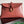 Borsa a tracolla BV Liberta con fibbia, 30 cm, in pelle di vacchetta rosso mattone