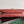 Borsa a tracolla BV Liberta con fibbia, 30 cm, in pelle di vacchetta rosso mattone