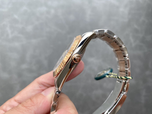 SKY-DWELLER TWO-TONE 42 ROSE GOLD BEZEL BROWN DIAL