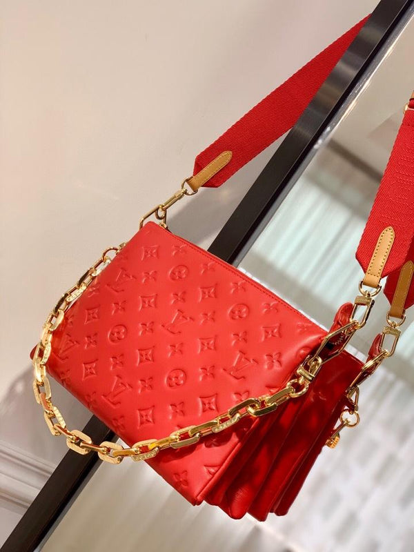 COUSSIN PM 27 PELLE DI AGNELLO GONFIABILE CON MONOGRAMMA ROSSO IN RILIEVO 