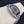 SANTOS DE CARTIE LARGE STEEL CASE BLACK BEZEL WHITE DIAL