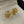 ANAGRAM GOLD STUD EARRINGS