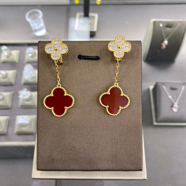 ORECCHINI IN ORO CON DIAMANTI E 2 MOTIVI CLOVER