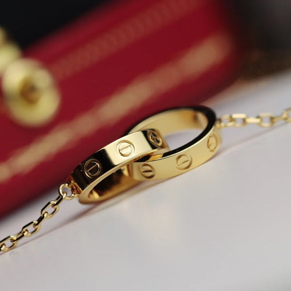 COLLANA LOVE DOPPIO ANELLO ORO