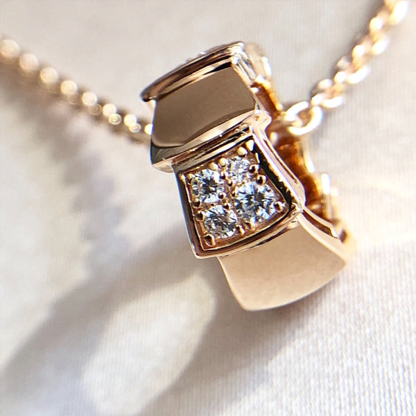 COLLANA IN ORO ROSA CON DIAMANTI E PEDANTE SERPENTI
