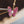 COLLANA IN ORO ROSA CON DIAMANTI ROSSI A FARFALLA