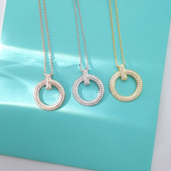 COLLANA CON PEDANTE A T E DIAMANTI