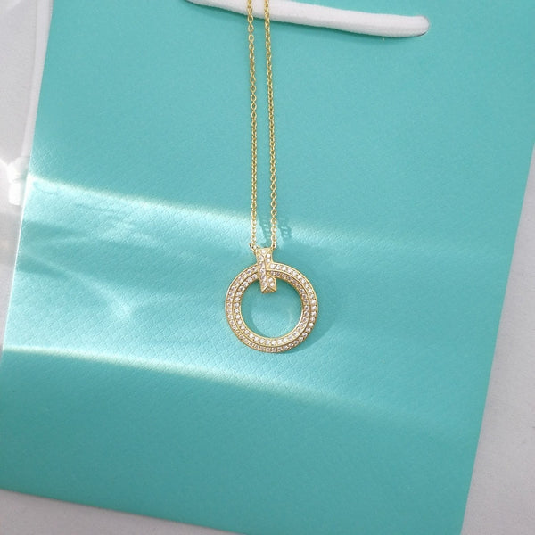 COLLANA CON PEDANTE A T E DIAMANTI