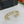 CC LOGO CUFF GOLD BRACELET