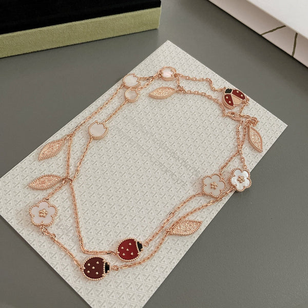 COLLANA IN ORO ROSA CON 15 MOTIVI LUCKY SPRING