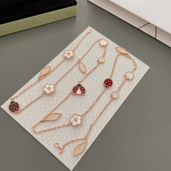 COLLANA IN ORO ROSA CON 15 MOTIVI LUCKY SPRING