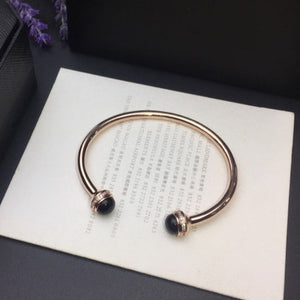 BRACELET OUVERT POSSESSION OR ROSE ONYX DIAMANT
