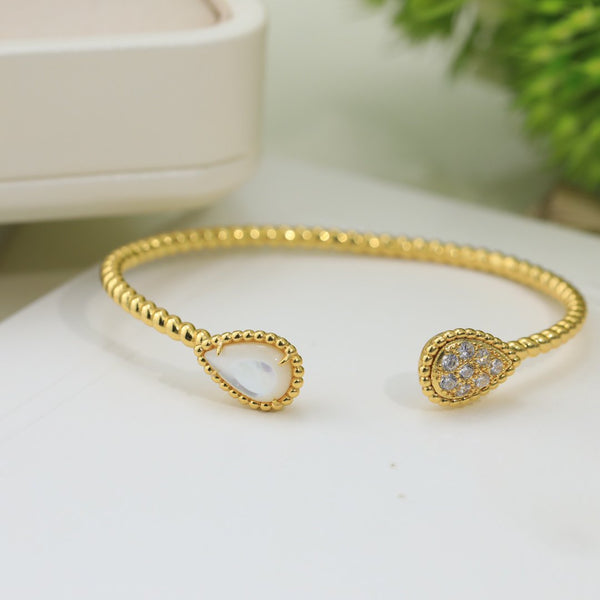 BRACCIALE APERTO IN ORO CON DIAMANTI E PIETRA SERPENT BOHEME