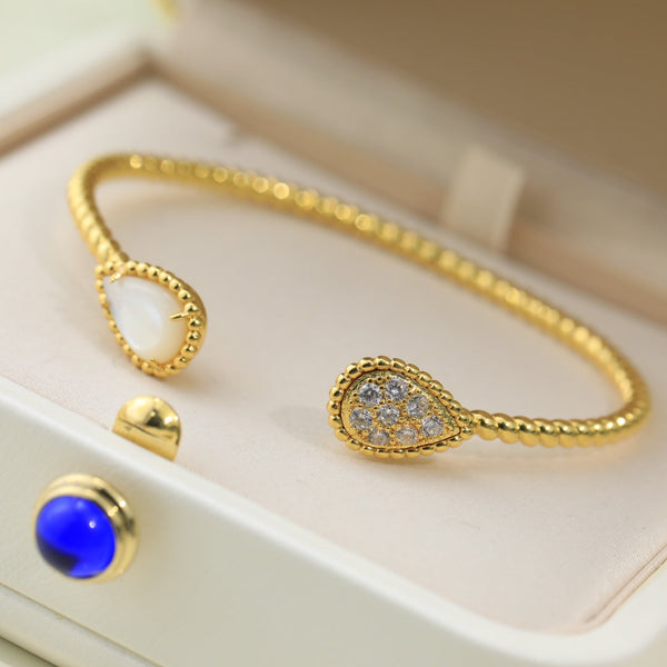 BRACCIALE APERTO IN ORO CON DIAMANTI E PIETRA SERPENT BOHEME