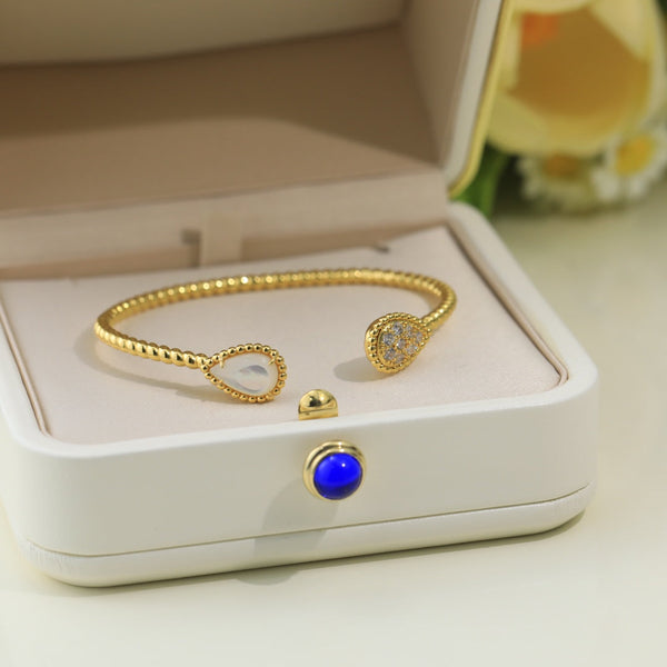 BRACCIALE APERTO IN ORO CON DIAMANTI E PIETRA SERPENT BOHEME
