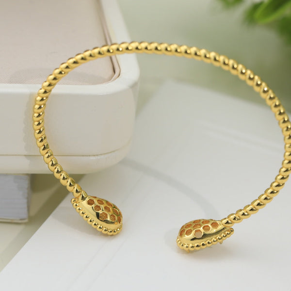 BRACCIALE APERTO IN ORO CON DIAMANTI E PIETRA SERPENT BOHEME