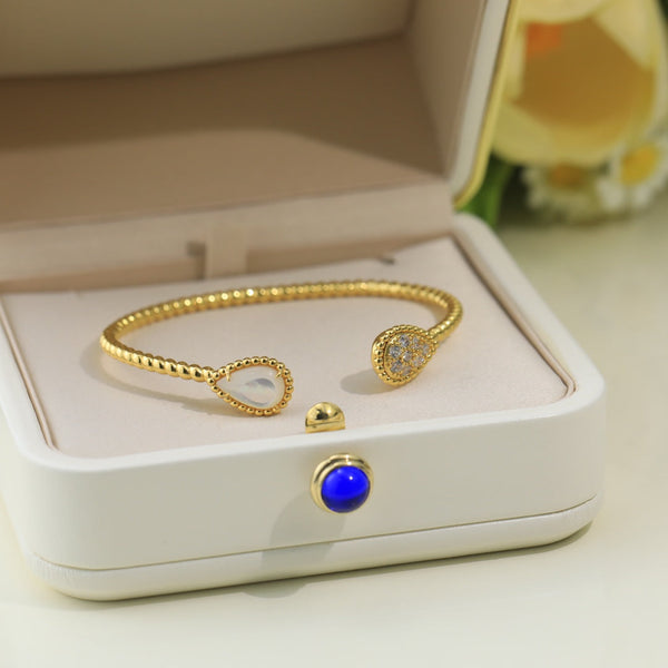 BRACCIALE APERTO IN ORO CON DIAMANTI E PIETRA SERPENT BOHEME