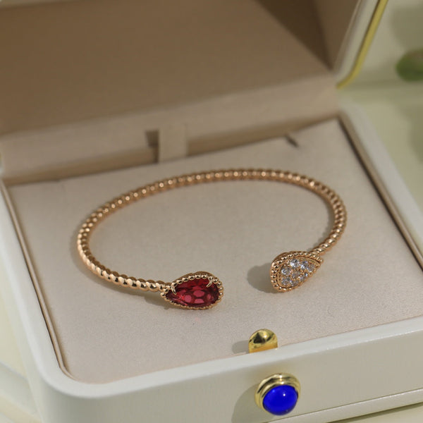 BRACCIALE APERTO BOHEME IN ORO ROSA CON DIAMANTI E CORNIOLA